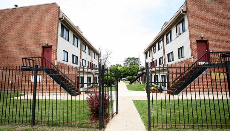 Lafayette Terrace Apartments fence and townhouses